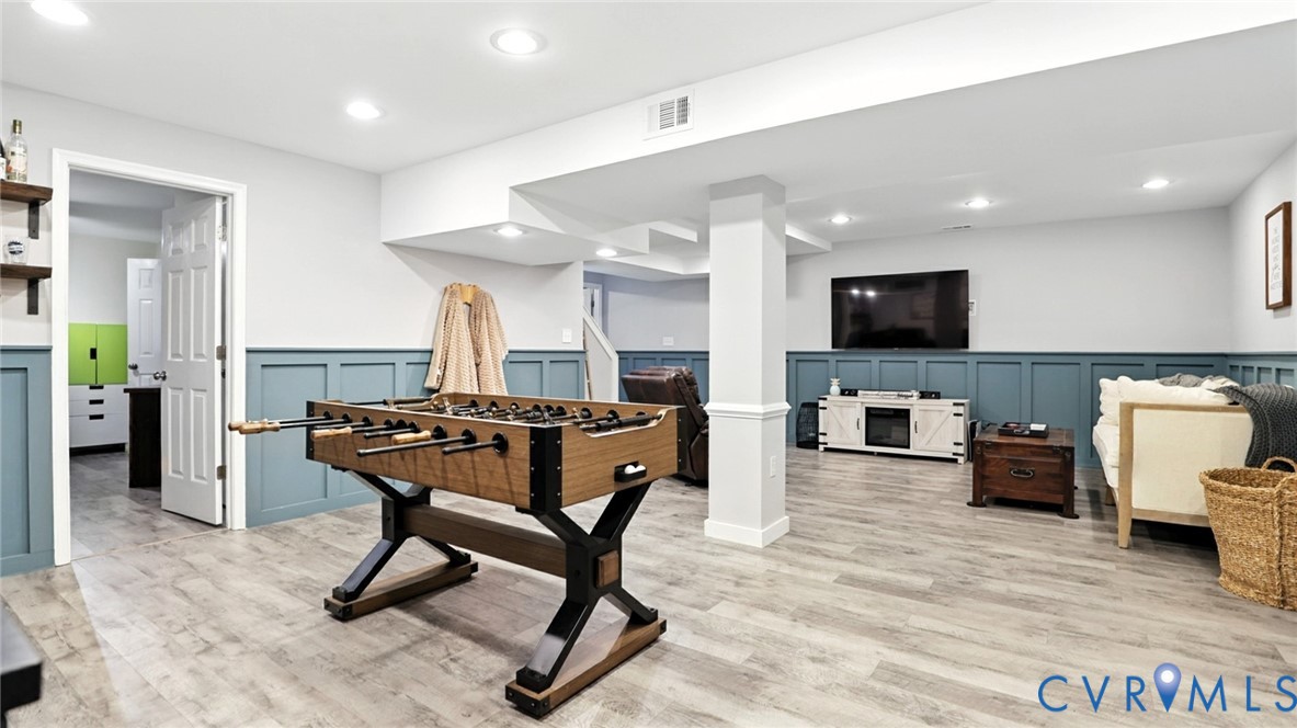 9743 Snowhill Road Richmond, VA 23235 - Photo 22 of 48 Playroom featuring a decorative wall, a wainscoted