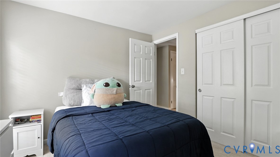 9743 Snowhill Road Richmond, VA 23235 - Photo 32 of 48 Carpeted bedroom featuring a closet