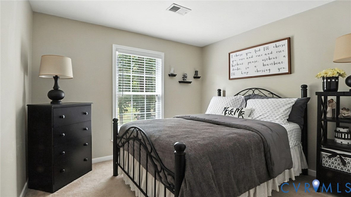 9743 Snowhill Road Richmond, VA 23235 - Photo 33 of 48 Carpeted bedroom with baseboards