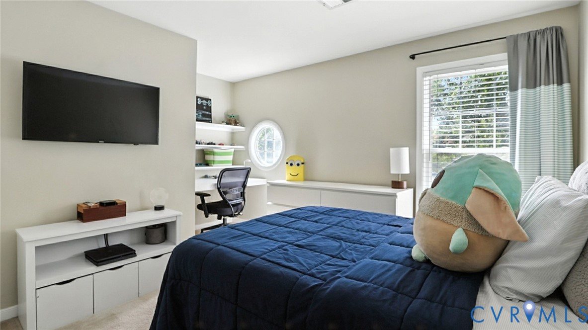 9743 Snowhill Road Richmond, VA 23235 - Photo 34 of 48 Carpeted bedroom featuring multiple windows and an
