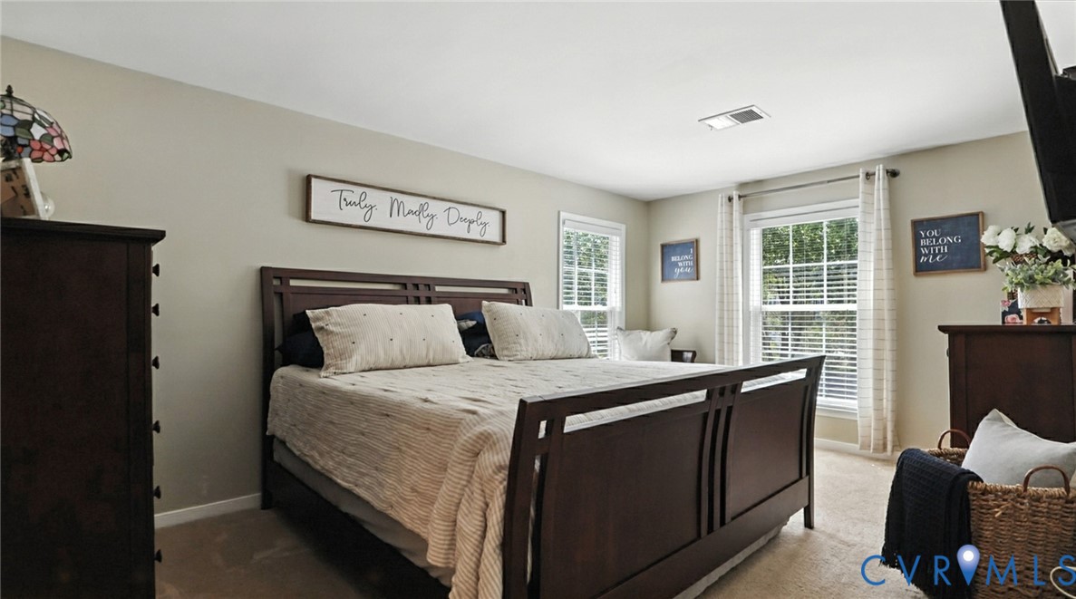 9743 Snowhill Road Richmond, VA 23235 - Photo 39 of 48 Carpeted bedroom with baseboards