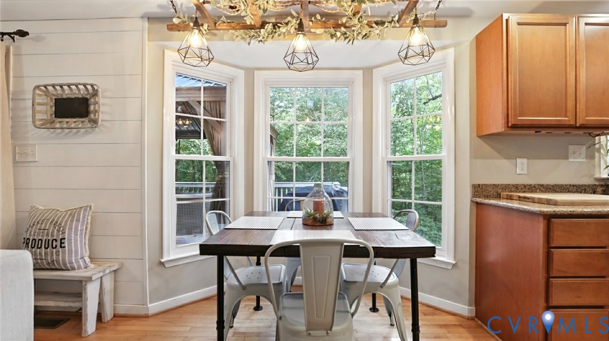 9743 Snowhill Road Richmond, VA 23235 - Photo 9 of 48 Dining space featuring light wood finished floors,