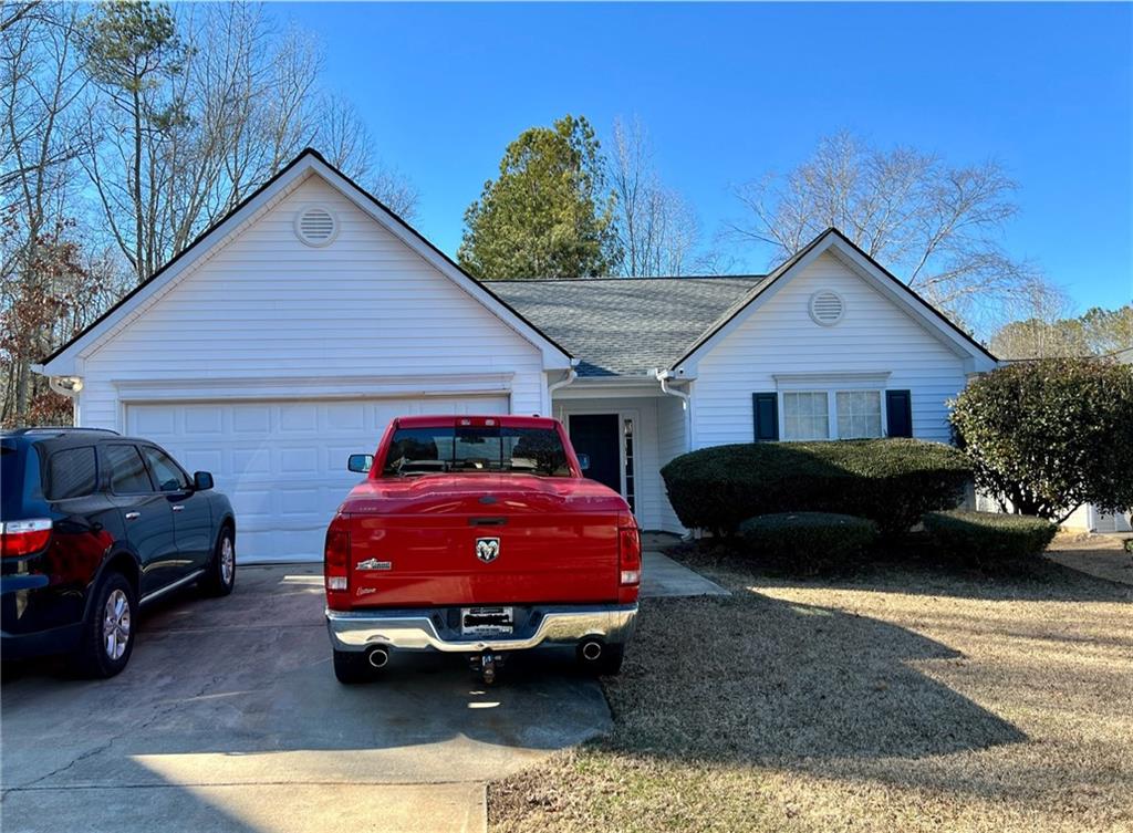 177 Goldleaf Drive Hampton, GA 30228 - Photo 1 of 1 a front view of a house with parking space