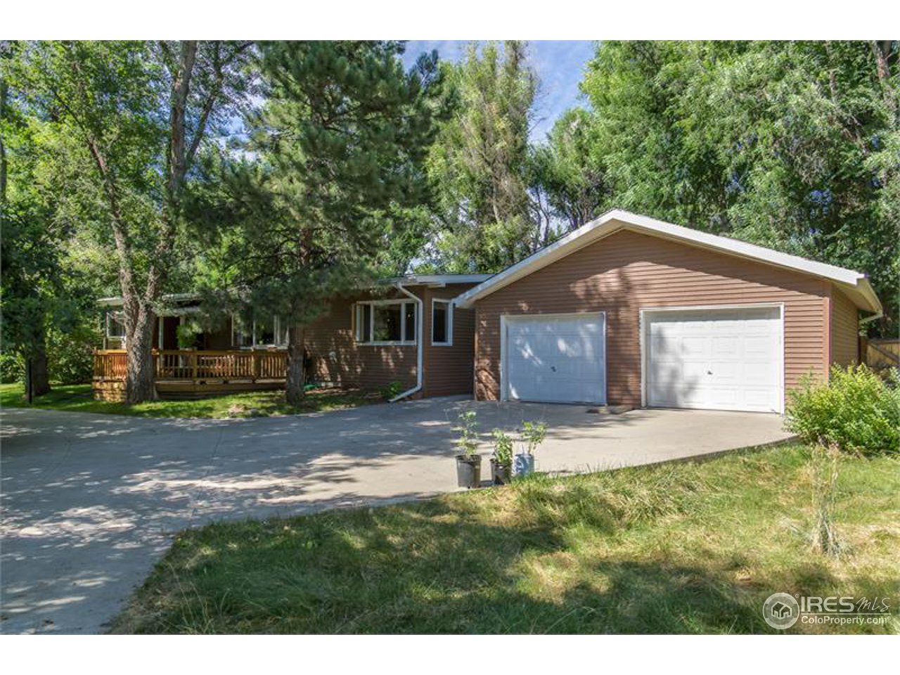 724 Gapter Road Boulder, CO 80303 - Photo 1 of 20 a house with trees in the background