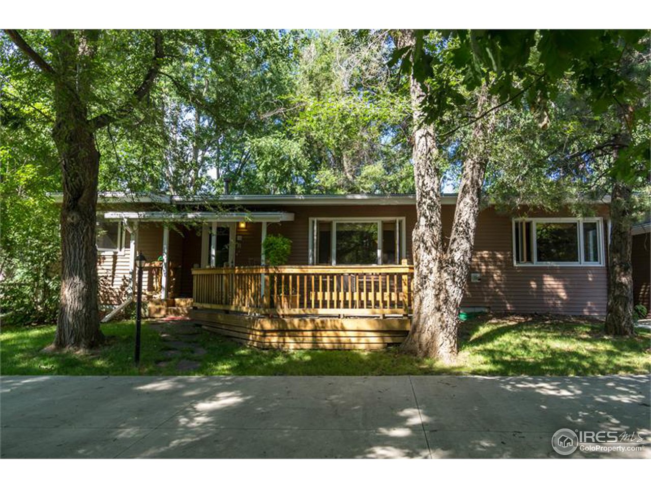 724 Gapter Road Boulder, CO 80303 - Photo 3 of 20 a house view with a garden space