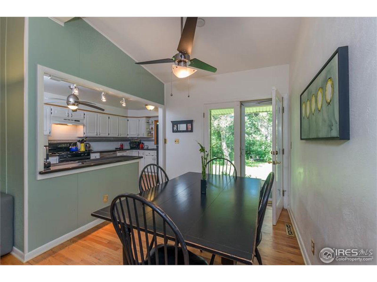 724 Gapter Road Boulder, CO 80303 - Photo 8 of 20 a dining room with furniture and a floor to ceiling window