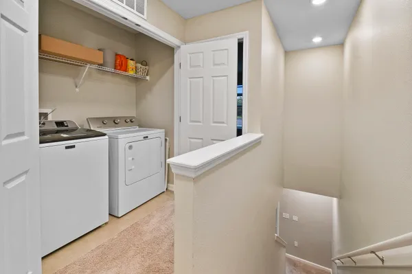 a room with dryer and washer
