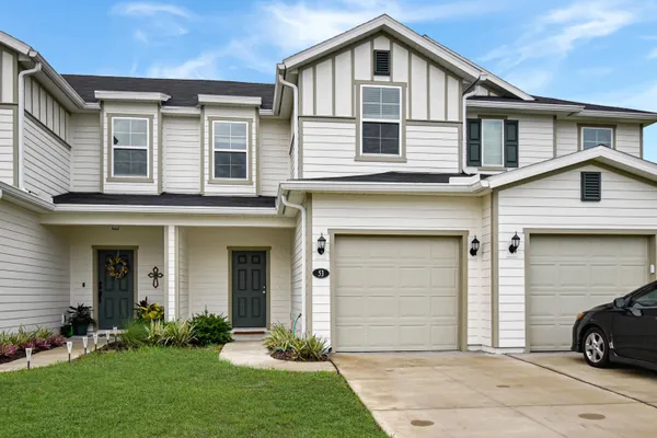 a car parked in front of a house