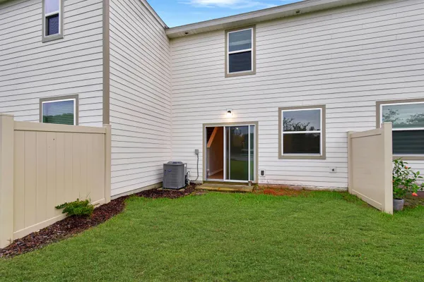 a view of back yard of the house