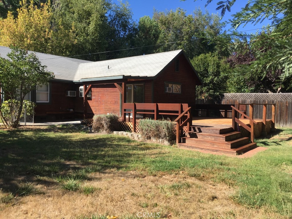 9633 Middle Creek Road Upper Lake, CA 95485 - Photo 2 of 4 a view of a house with backyard
