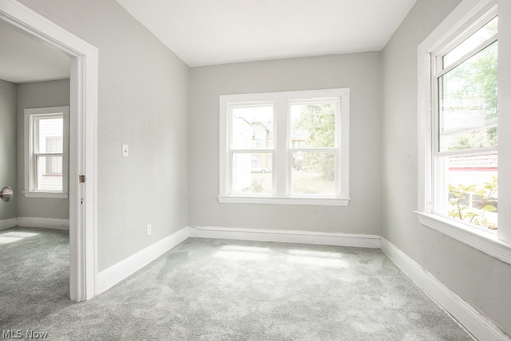 1000 Eddy Road Cleveland, OH 44108 - Photo 19 of 38 Carpeted empty room with baseboards