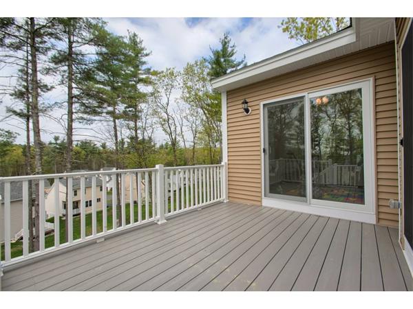 36 Indian Ridge Terrace, Unit 36 Westford, MA 01886 - Photo 22 of 23 a view of balcony with wooden floor