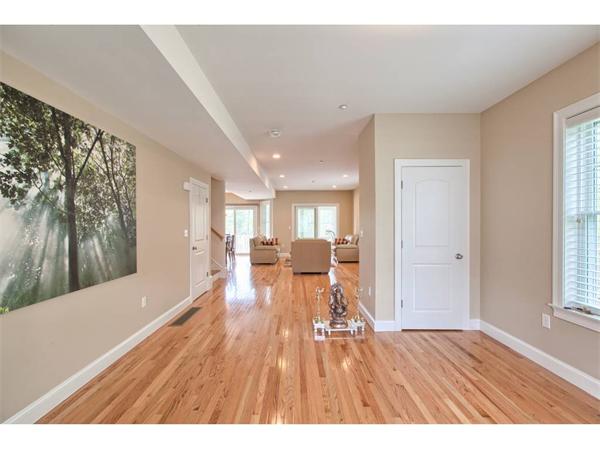 36 Indian Ridge Terrace, Unit 36 Westford, MA 01886 - Photo 3 of 23 a living room with furniture and a wooden floor