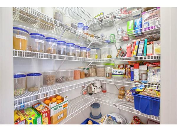 36 Indian Ridge Terrace, Unit 36 Westford, MA 01886 - Photo 8 of 23 a picture of a cabinet with a book shelf