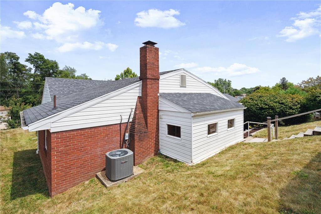 2433 Brodhead Road Aliquippa, PA 15001 - Photo 35 of 37 a house view with a backyard space