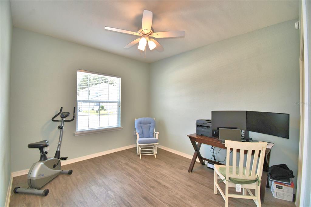 4340 Reding Way Lakeland, FL 33813 - Photo 22 of 63 a view of a dining room with furniture and a chandelier