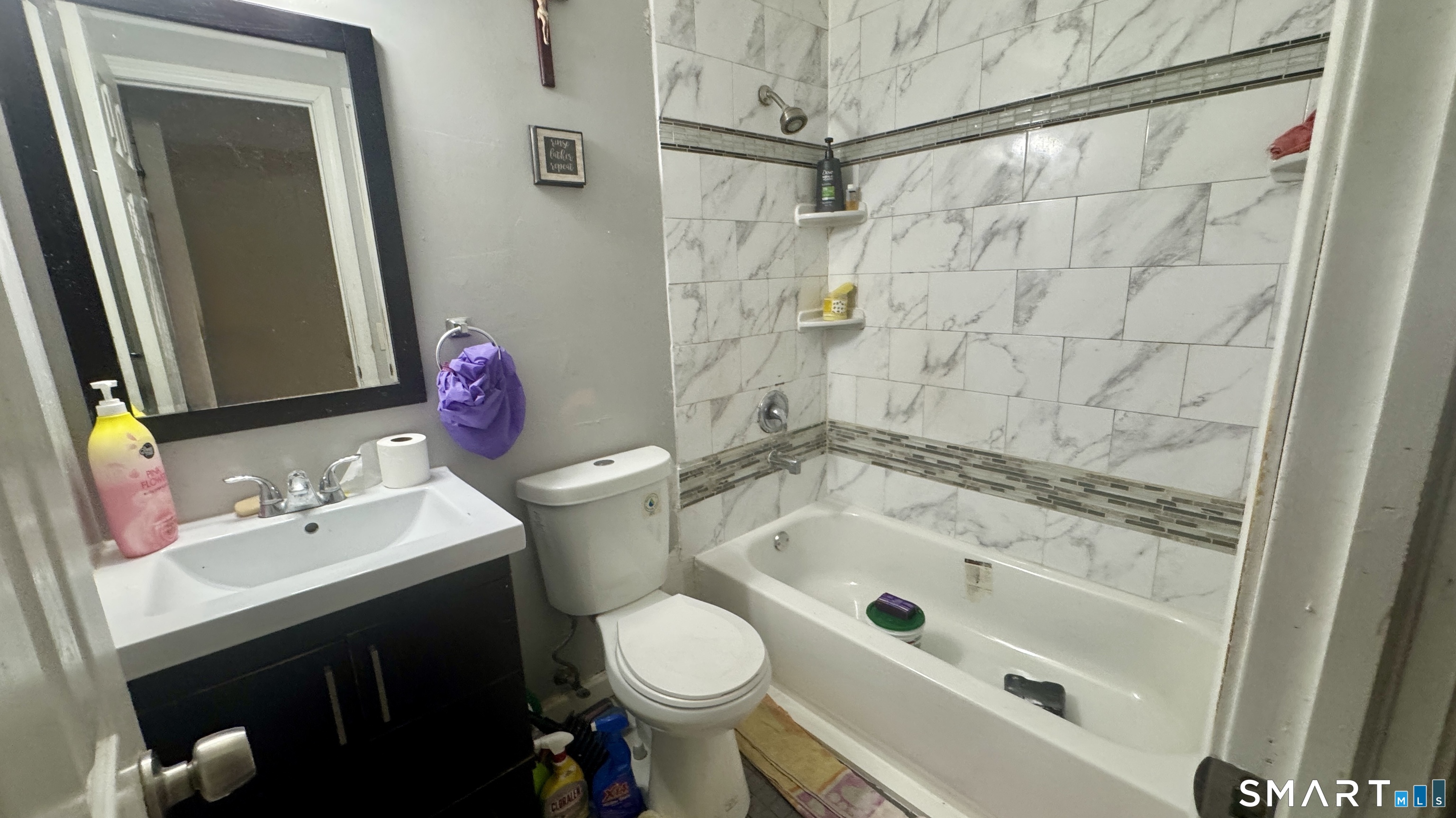 49 Ridge Road, Unit 2 Naugatuck, CT 06770 - Photo 6 of 7 a bathroom with a sink toilet and shower