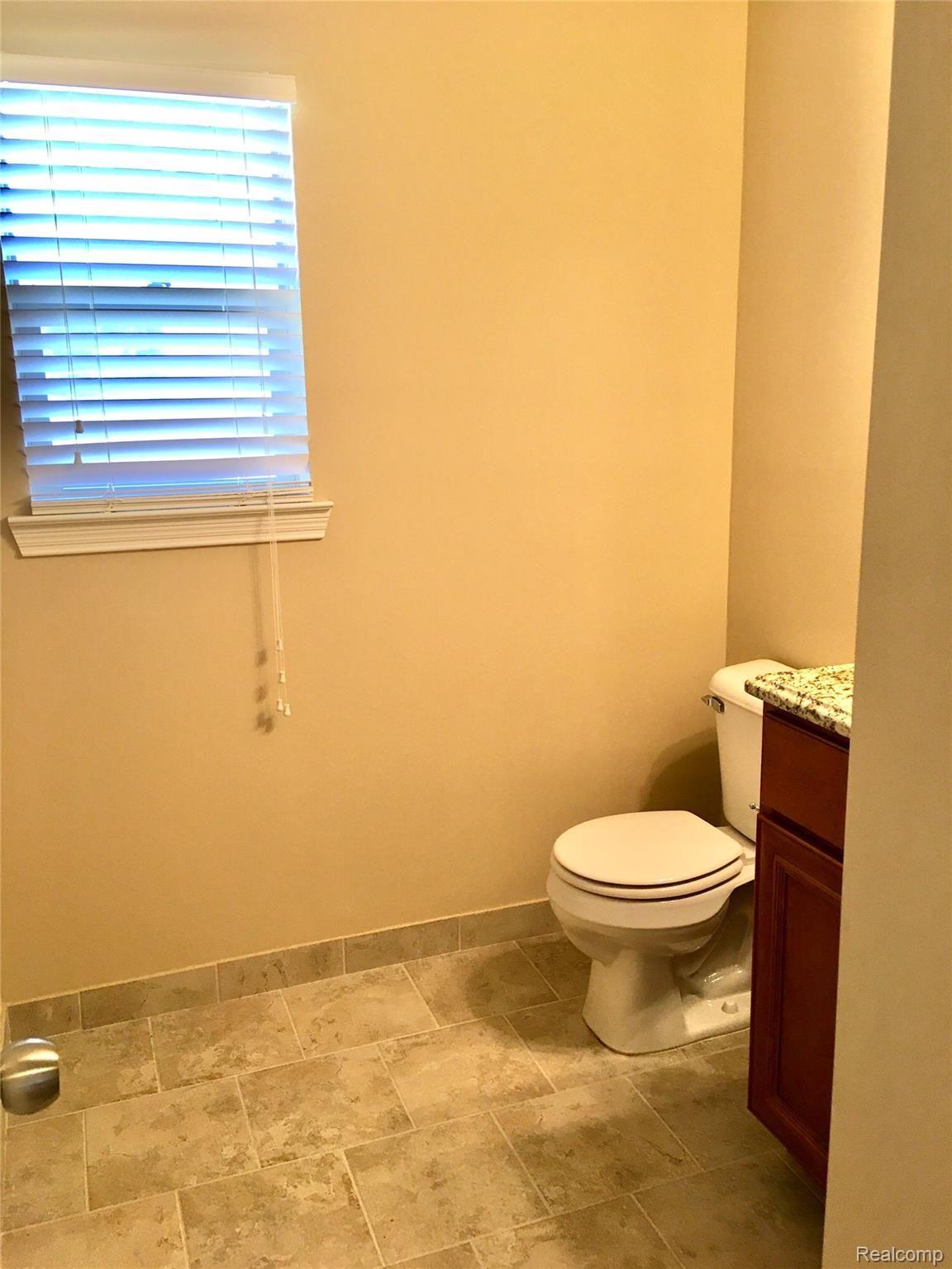 16510 Moore Park Road Macomb, MI 48044 - Photo 17 of 38 Powder room.JPG