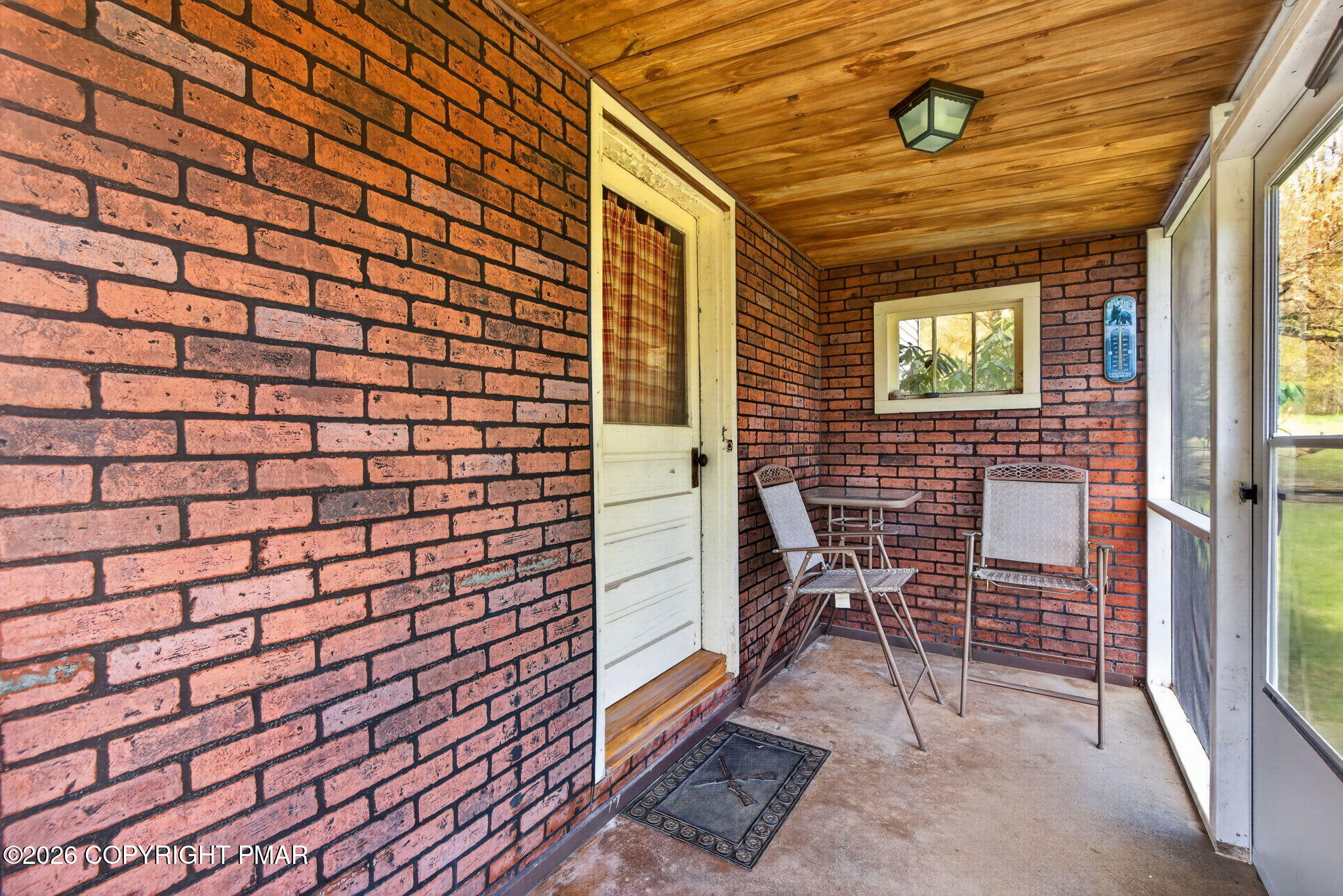 448 Criddle Road Susquehanna, PA 18847 - Photo 16 of 55 a backyard of a house with outdoor seating