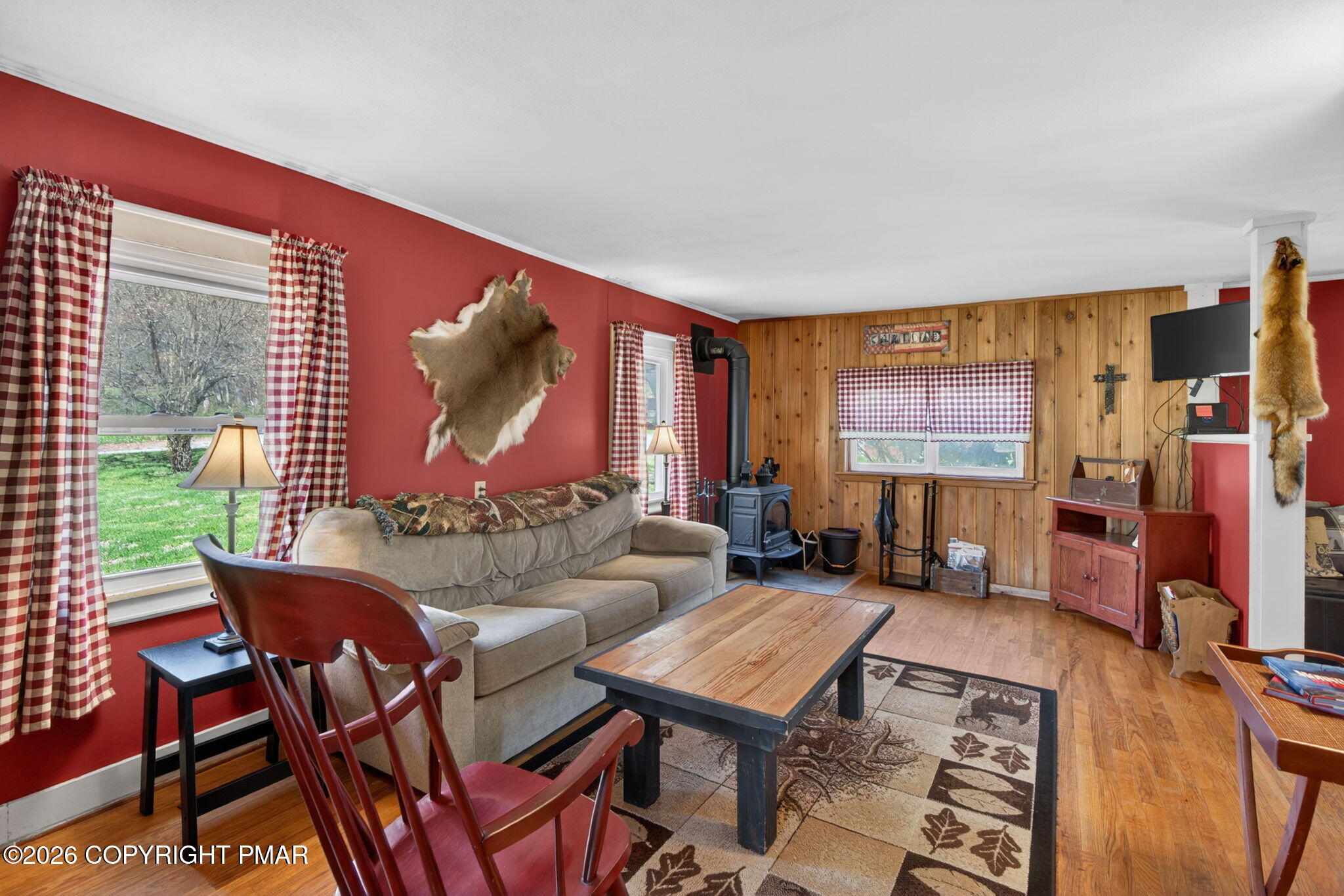 448 Criddle Road Susquehanna, PA 18847 - Photo 31 of 55 a living room with furniture and a flat screen tv