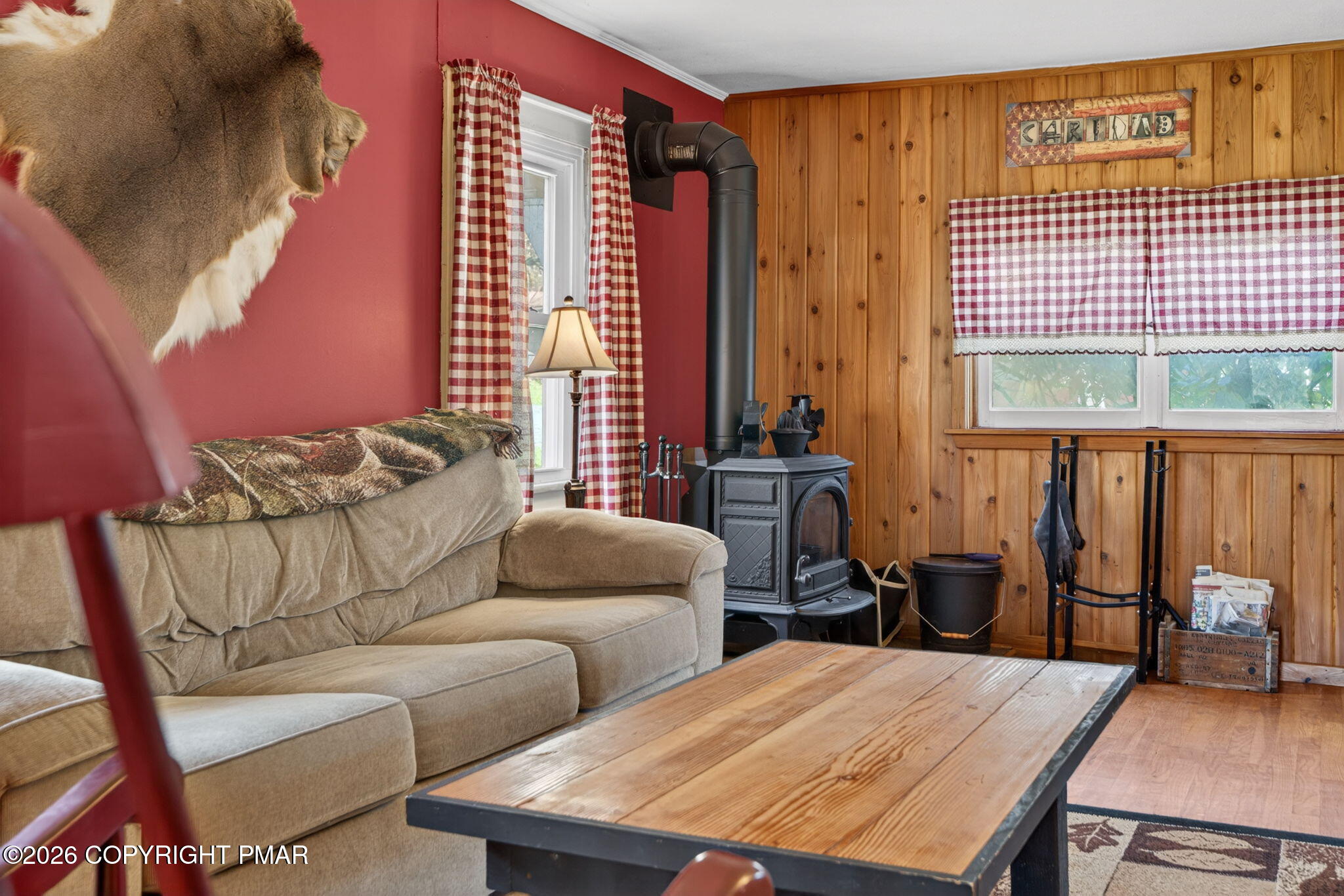 448 Criddle Road Susquehanna, PA 18847 - Photo 32 of 55 a living room with furniture and a large window