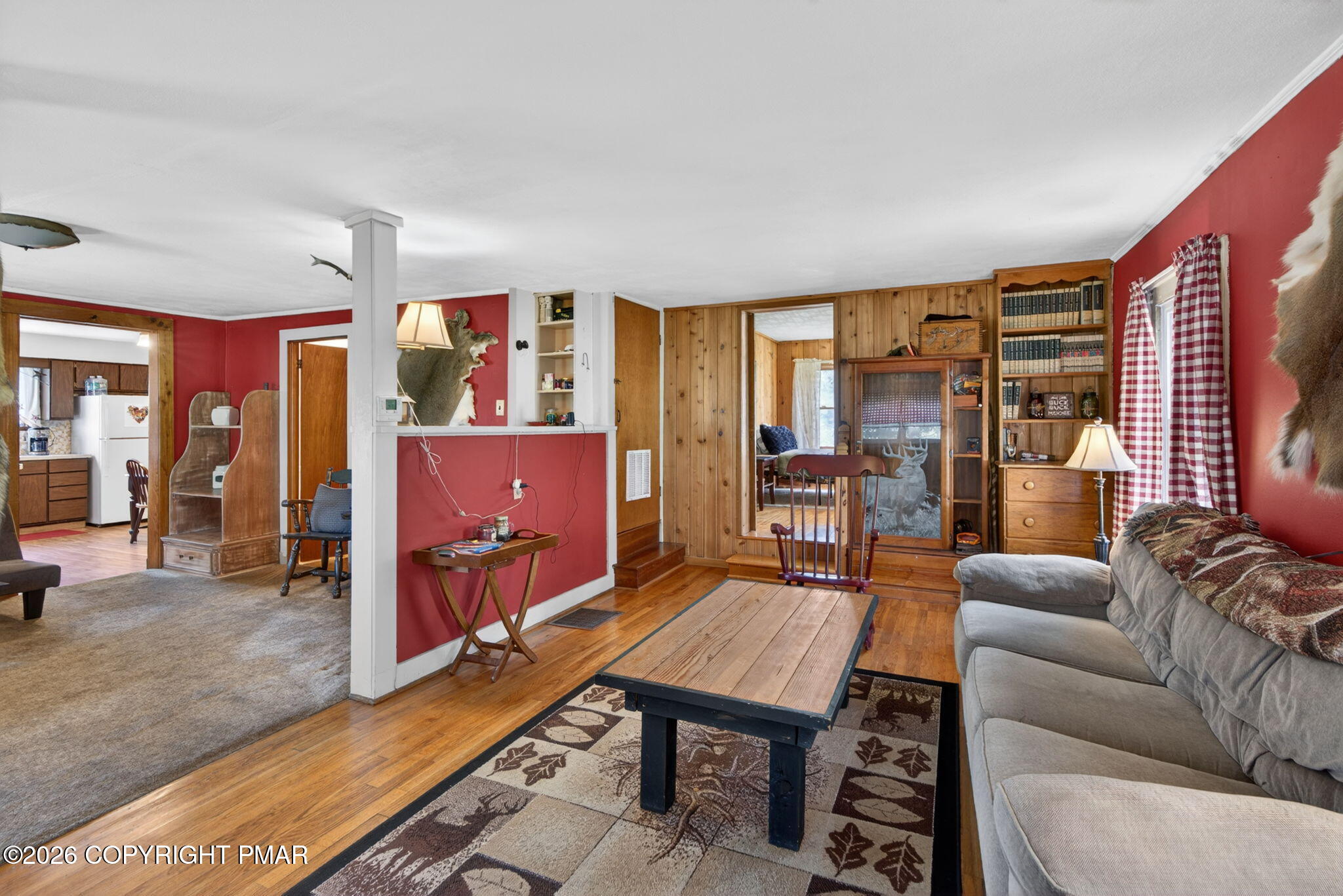 448 Criddle Road Susquehanna, PA 18847 - Photo 35 of 55 a living room with furniture a rug and a flat screen tv