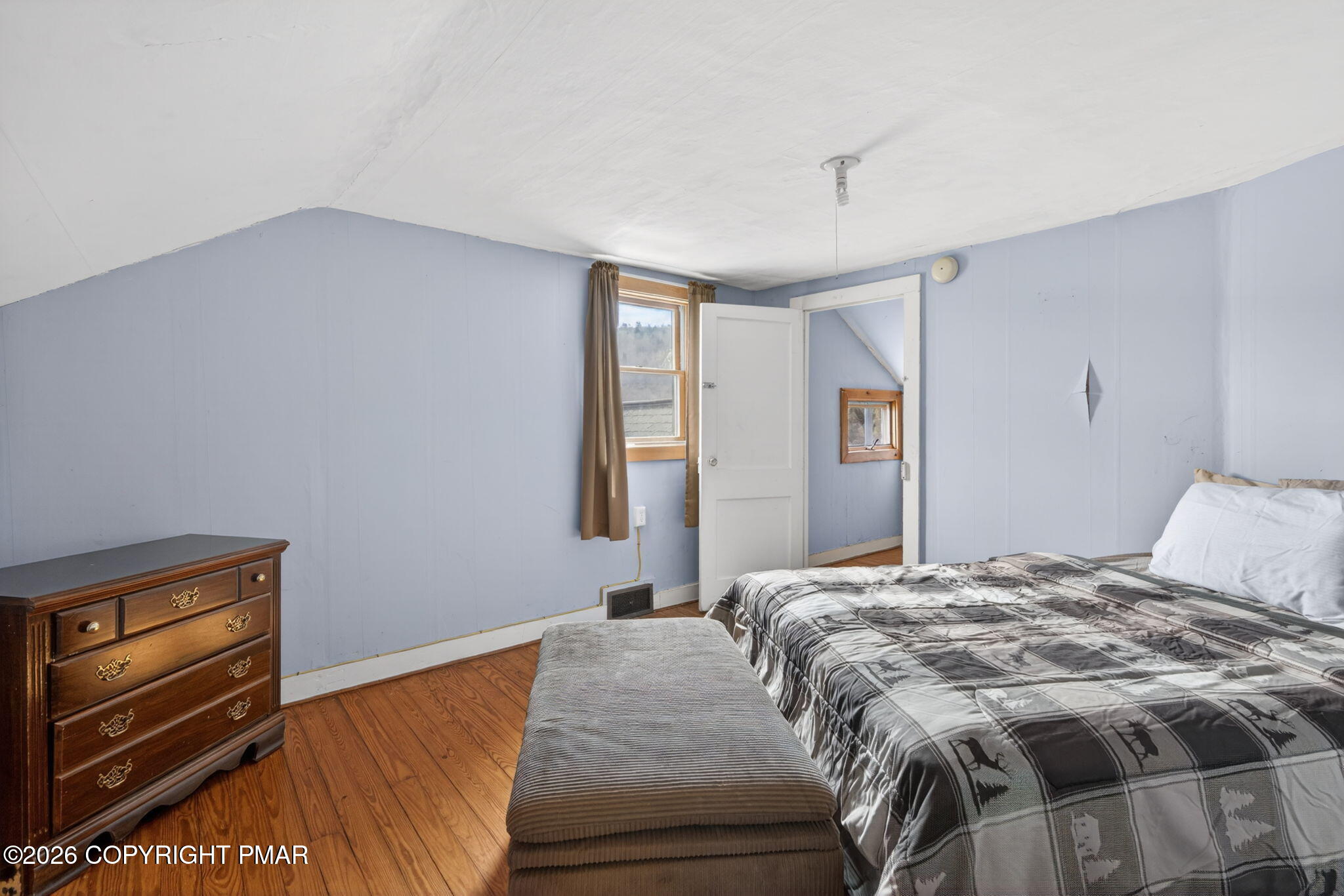 448 Criddle Road Susquehanna, PA 18847 - Photo 43 of 55 a bedroom with a bed and a flat tv screen on dresser