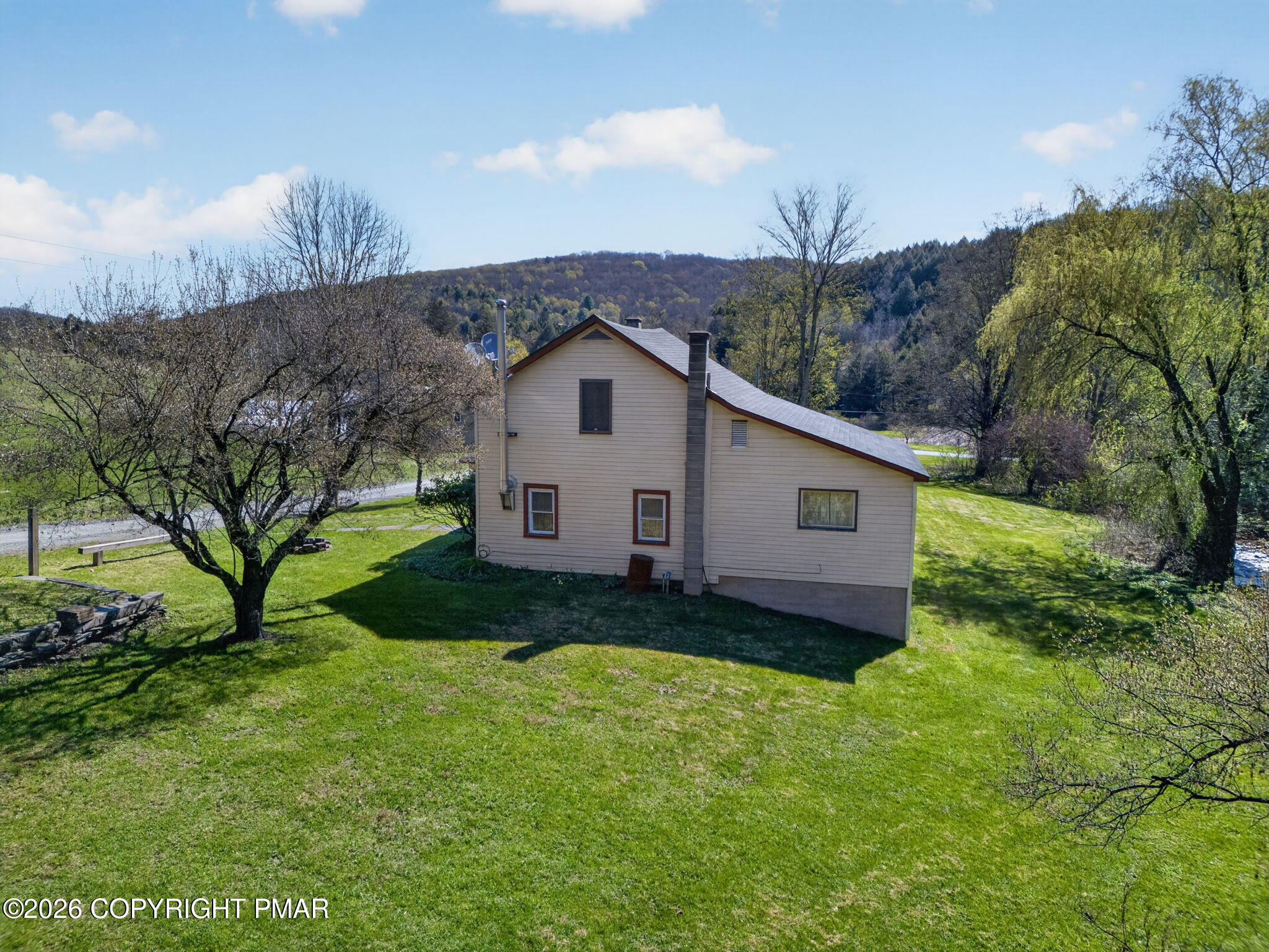 448 Criddle Road Susquehanna, PA 18847 - Photo 5 of 55 a house view with a garden space