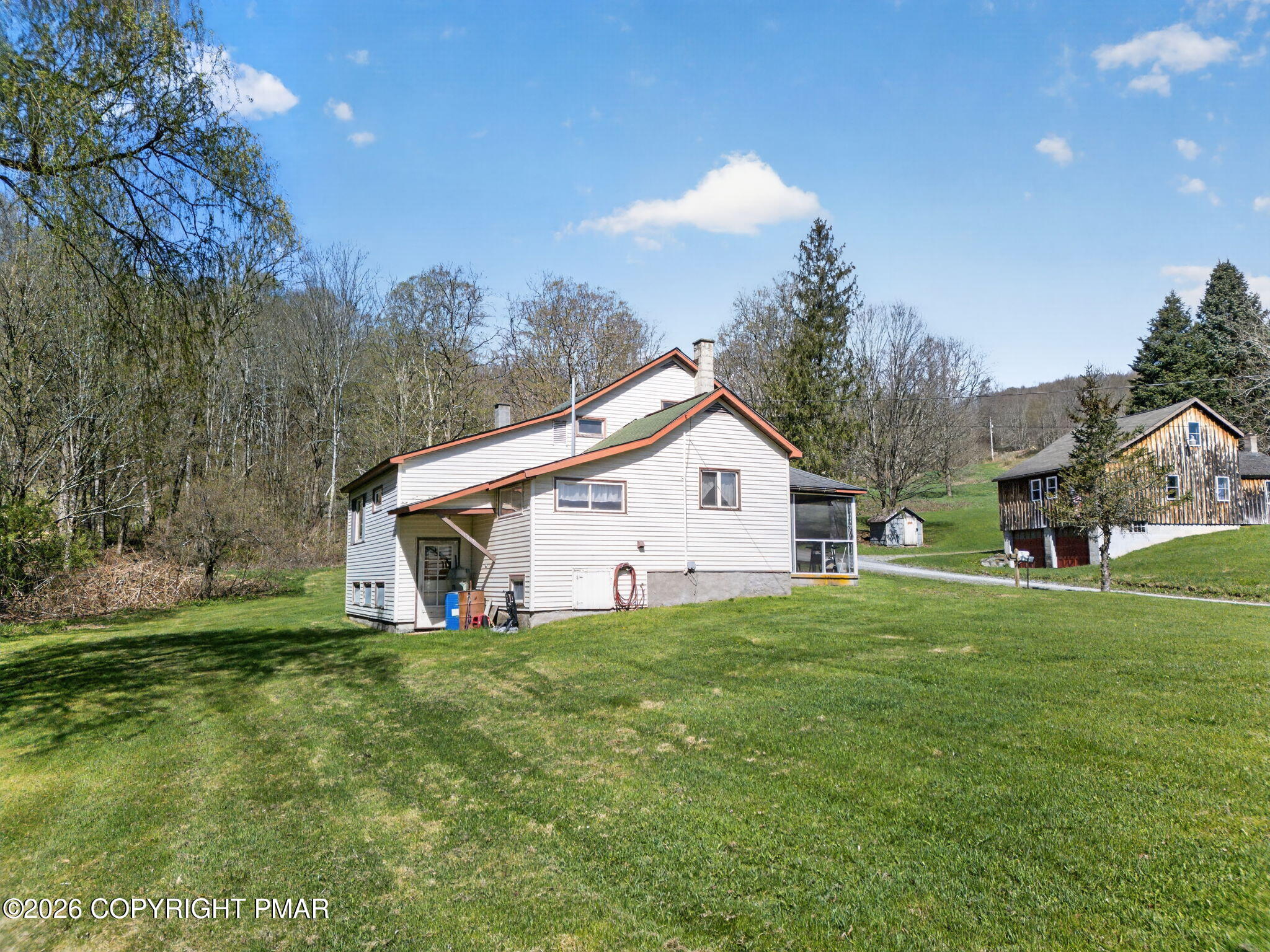 448 Criddle Road Susquehanna, PA 18847 - Photo 8 of 55 a view of a house with a yard