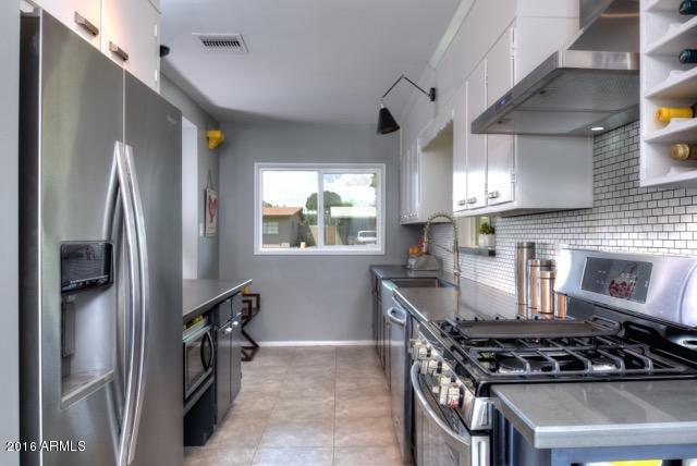 825 West Picadilly Road Phoenix, AZ 85013 - Photo 14 of 36 KItchen With Stainless Appliance Package