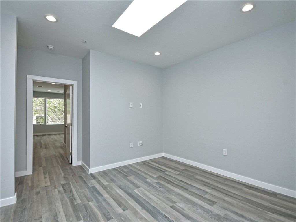 2108 Tillery Street, Unit 2102 Austin, TX 78723 - Photo 15 of 26 This space could be used as a game room, playroom, or reading nook.
