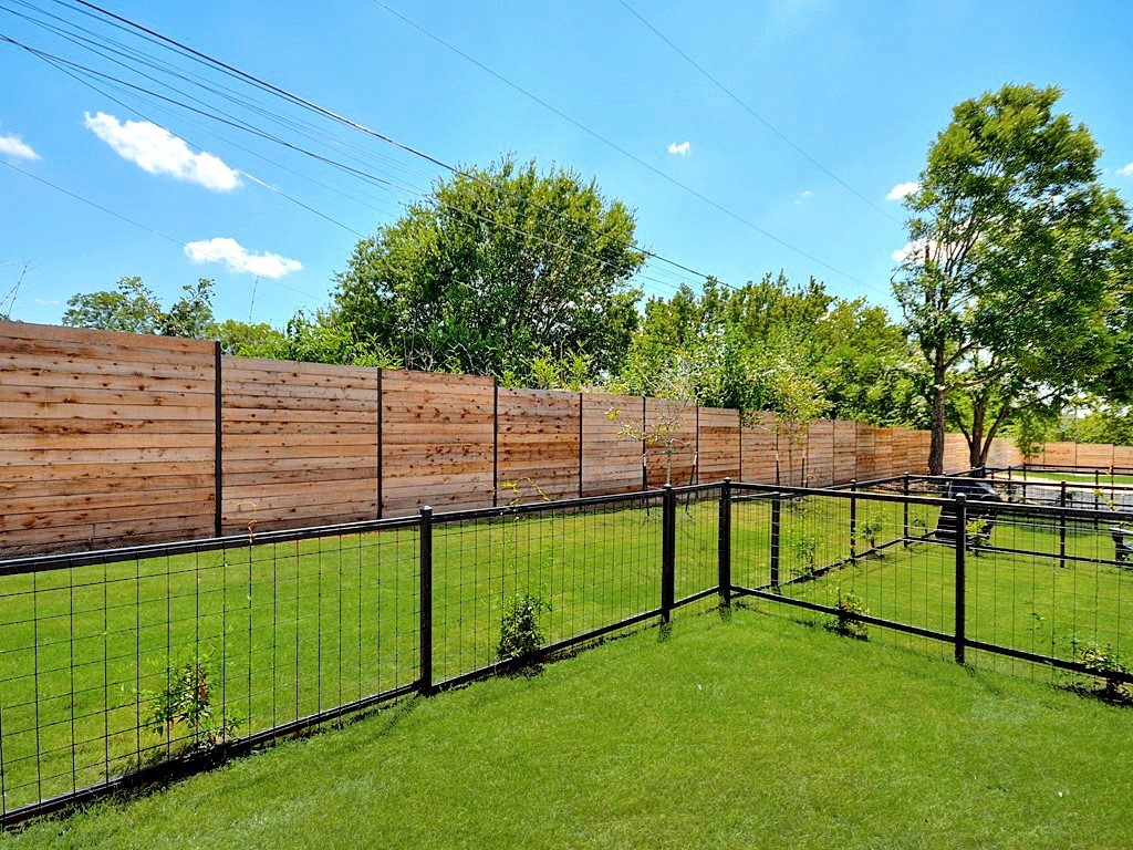 2108 Tillery Street, Unit 2102 Austin, TX 78723 - Photo 25 of 26 Small fenced yard