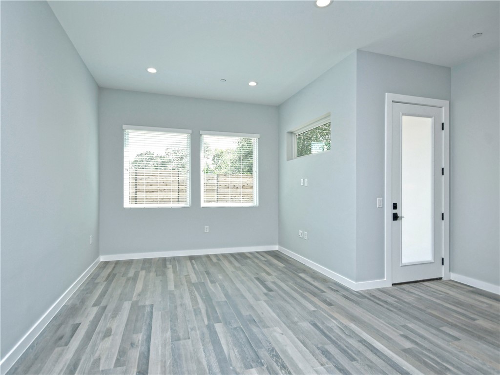 2108 Tillery Street, Unit 2102 Austin, TX 78723 - Photo 7 of 26 The living room is a wonderful place to relax at the end of a long day.