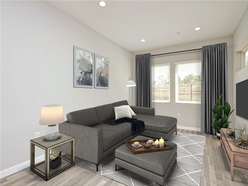 2108 Tillery Street, Unit 2102 Austin, TX 78723 - Photo 8 of 26 The living room is well lit with recessed lighting and large windows that fill the home with sunlight. *This image is virtually staged*