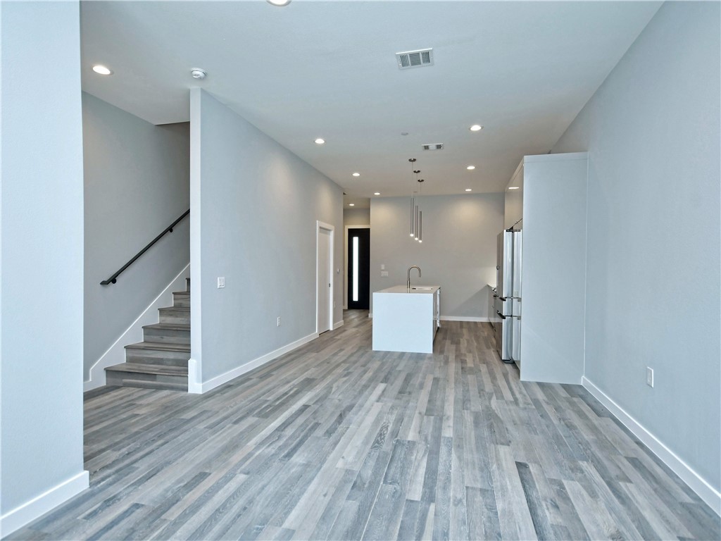 2108 Tillery Street, Unit 2102 Austin, TX 78723 - Photo 26 of 26 The open-concept floorplan is perfect for entertaining guests.