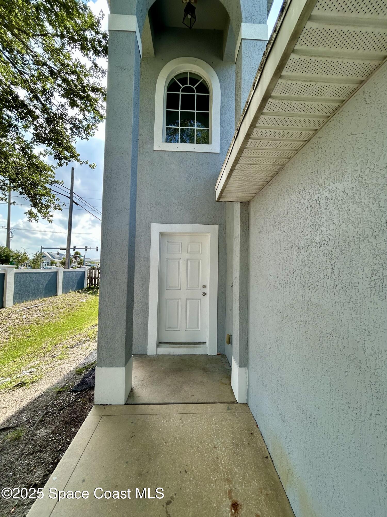 910 Twisting Branch Court Melbourne, FL 32935 - Photo 2 of 24 a view of a entryway