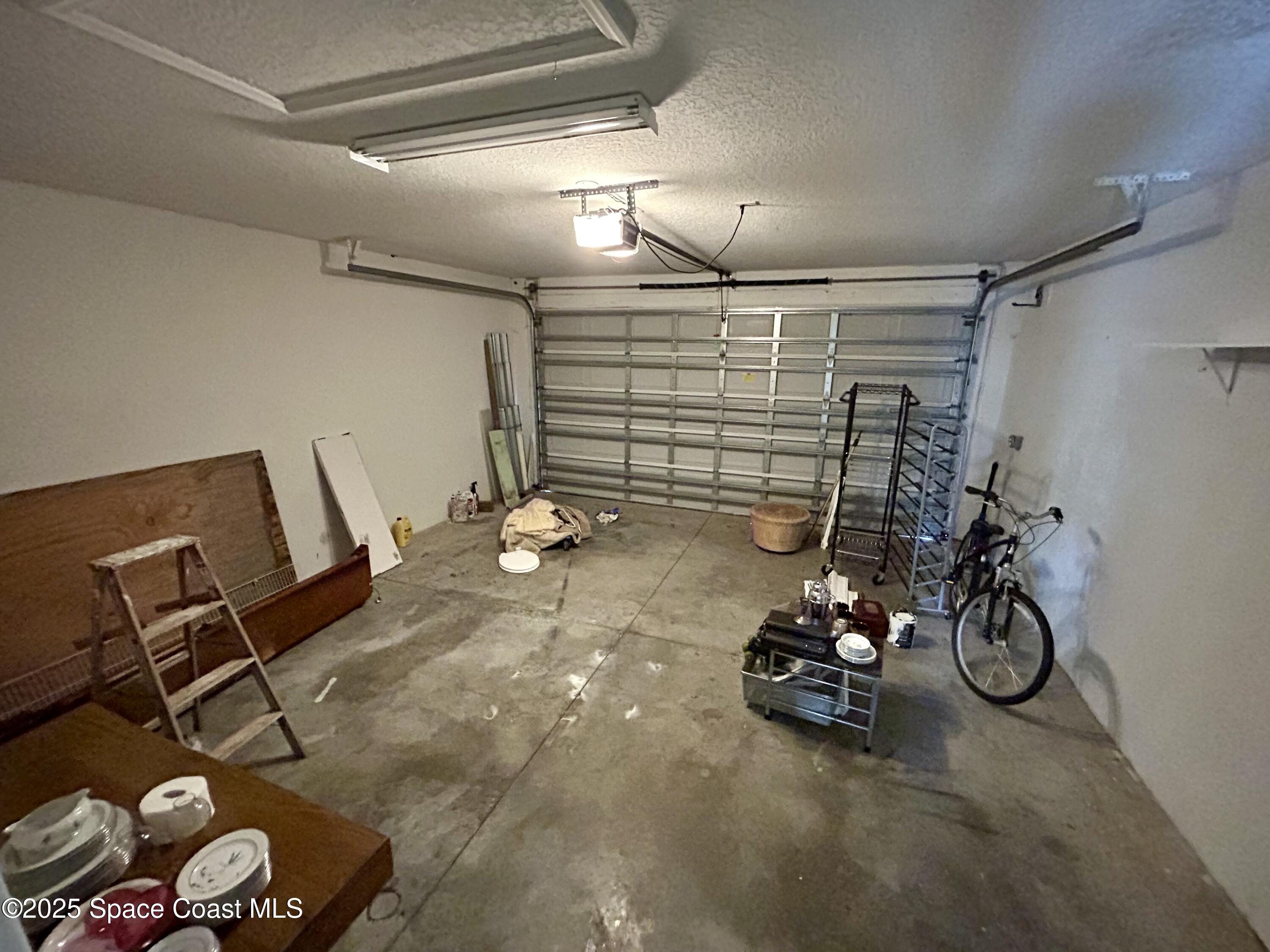 910 Twisting Branch Court Melbourne, FL 32935 - Photo 24 of 24 a view of a room with gym equipment