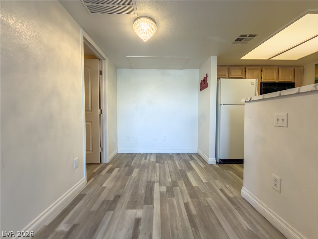 8070 West Russell Road, Unit 2063 Las Vegas, NV 89113 - Photo 3 of 9 Functional kitchen with ample cabinet space and durable flooring.