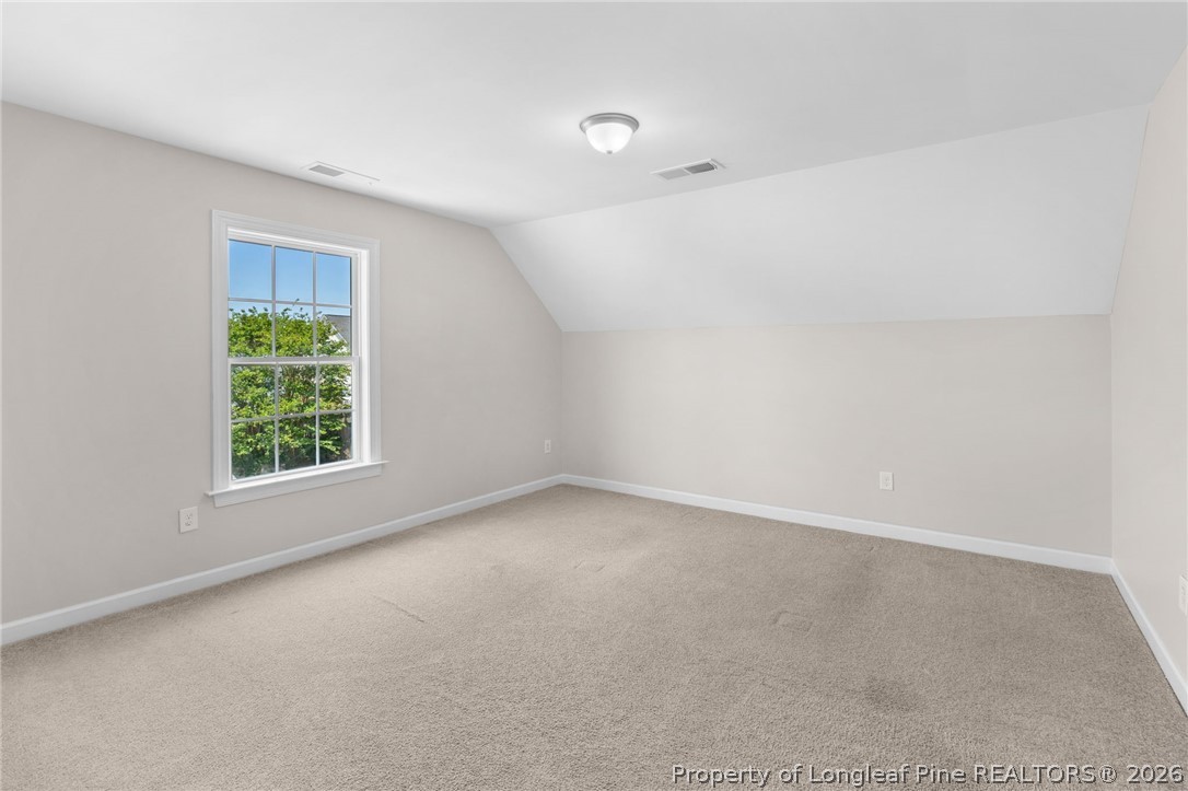 50 Huzzas Circle Cameron, NC 28326 - Photo 35 of 39 an empty room with a window