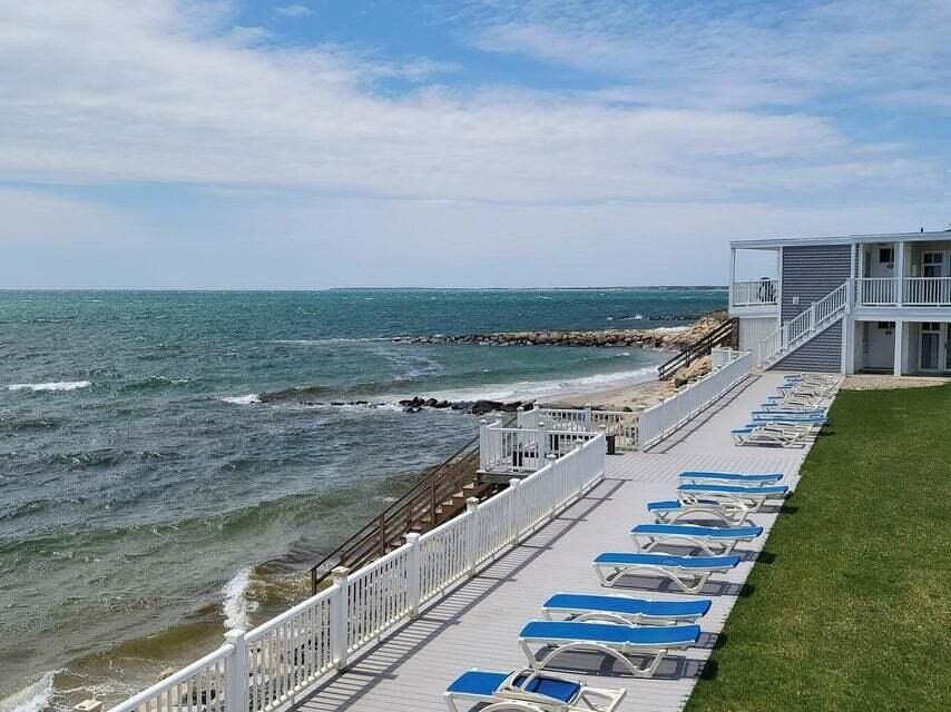 113 Old Wharf Road, Unit 7 Dennis, MA 02639 - Photo 1 of 27 a view of a city with ocean view