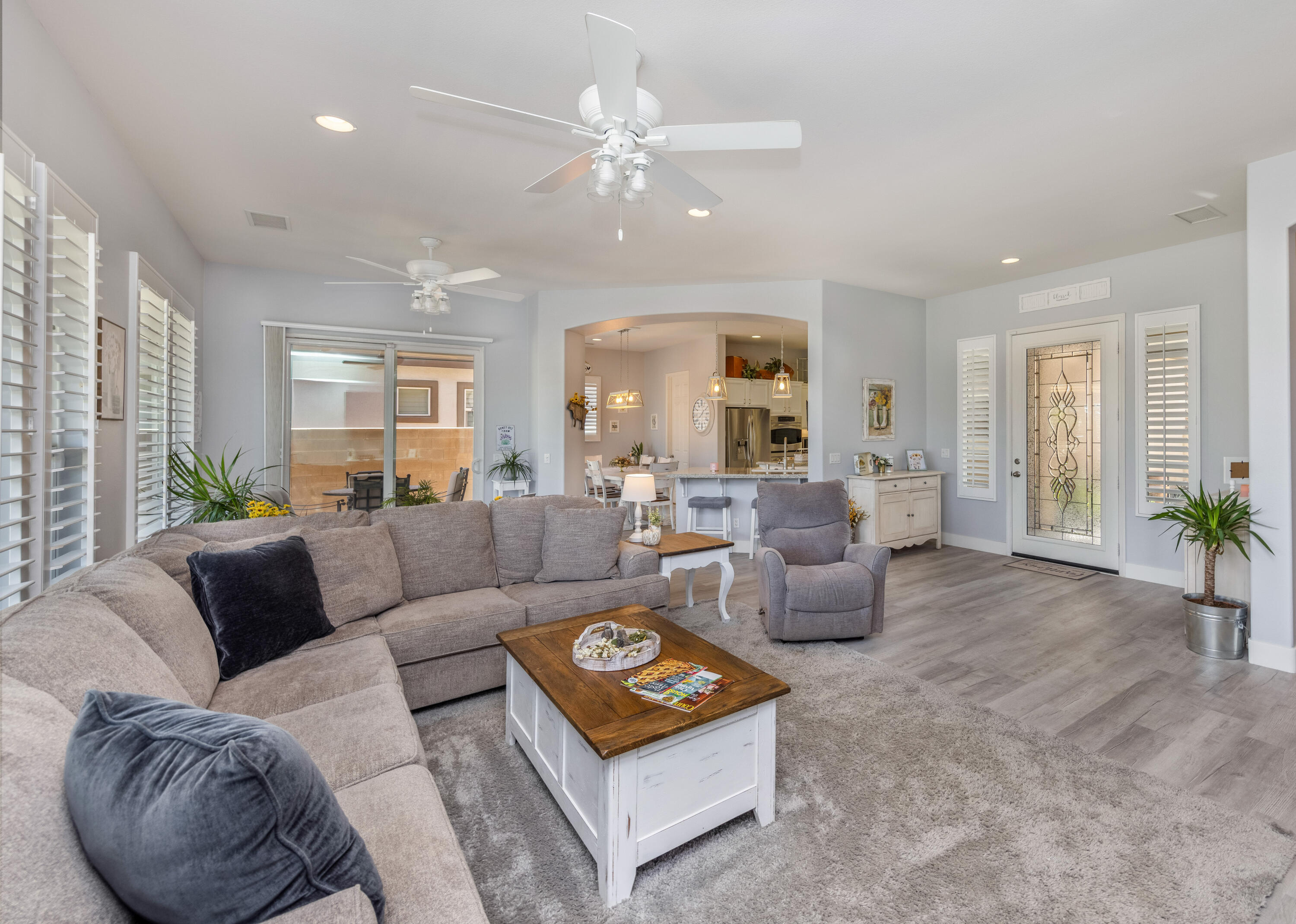 61232 Cactus Spring Drive La Quinta, CA 92253 - Photo 11 of 43 a living room with furniture and a large window
