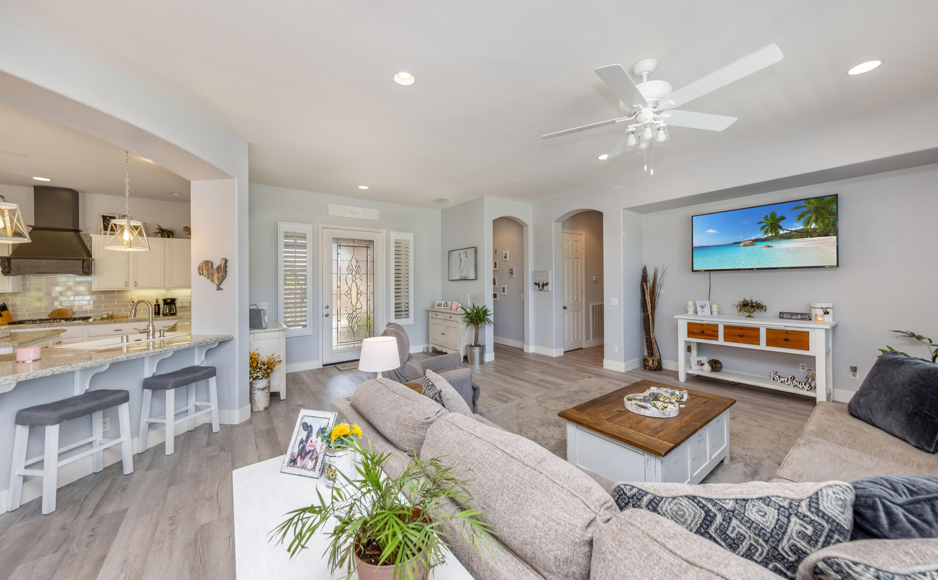 61232 Cactus Spring Drive La Quinta, CA 92253 - Photo 12 of 43 a living room with furniture kitchen view and a table