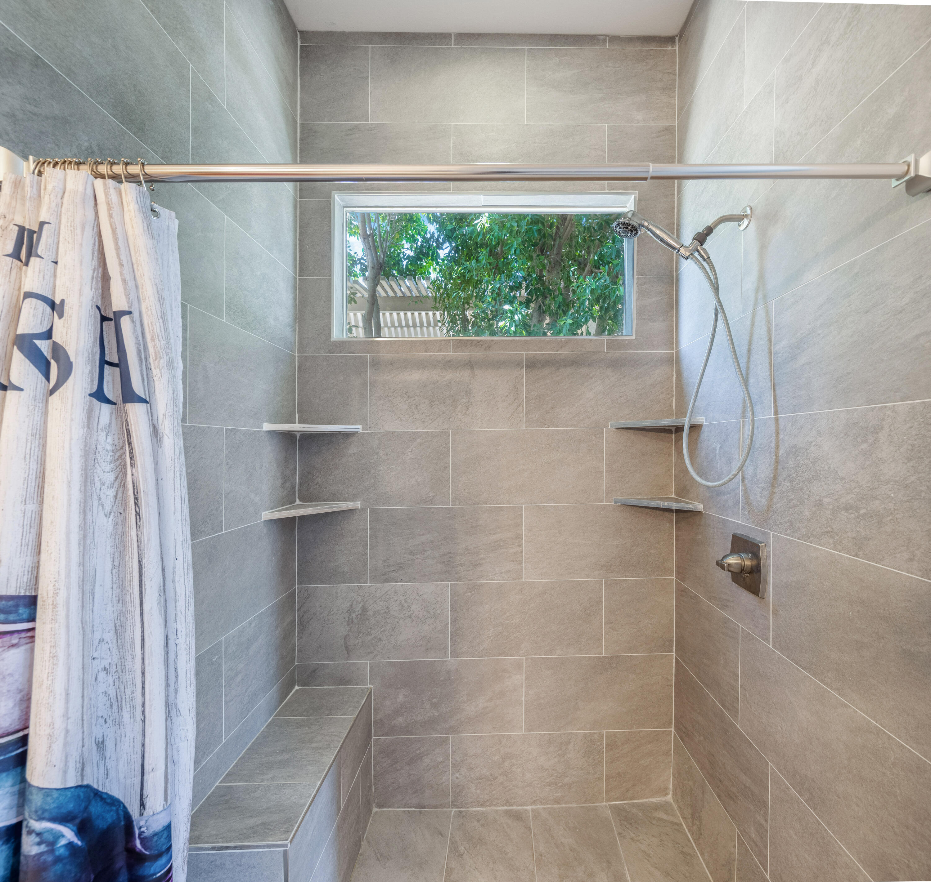 61232 Cactus Spring Drive La Quinta, CA 92253 - Photo 21 of 43 a bathroom with a shower