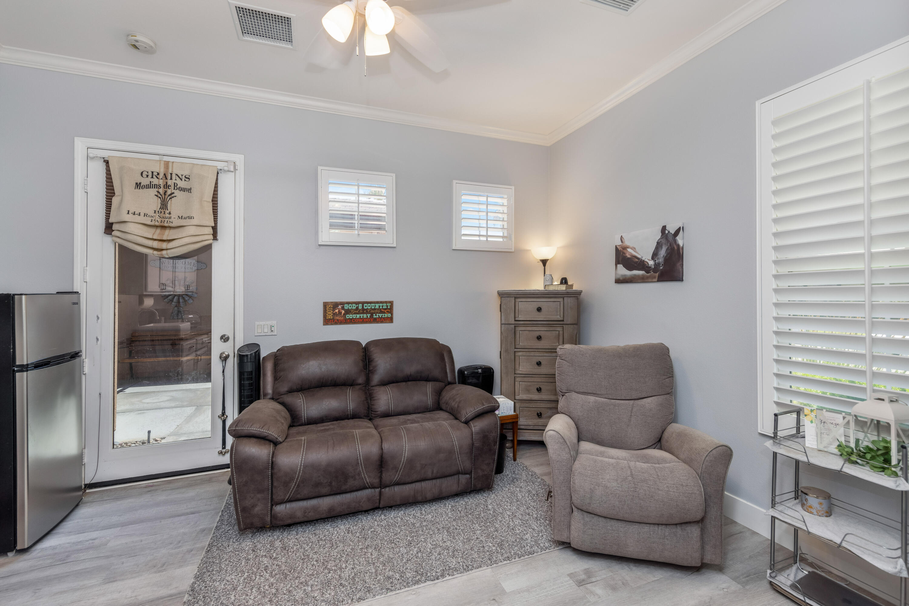 61232 Cactus Spring Drive La Quinta, CA 92253 - Photo 26 of 43 a living room with furniture and a window