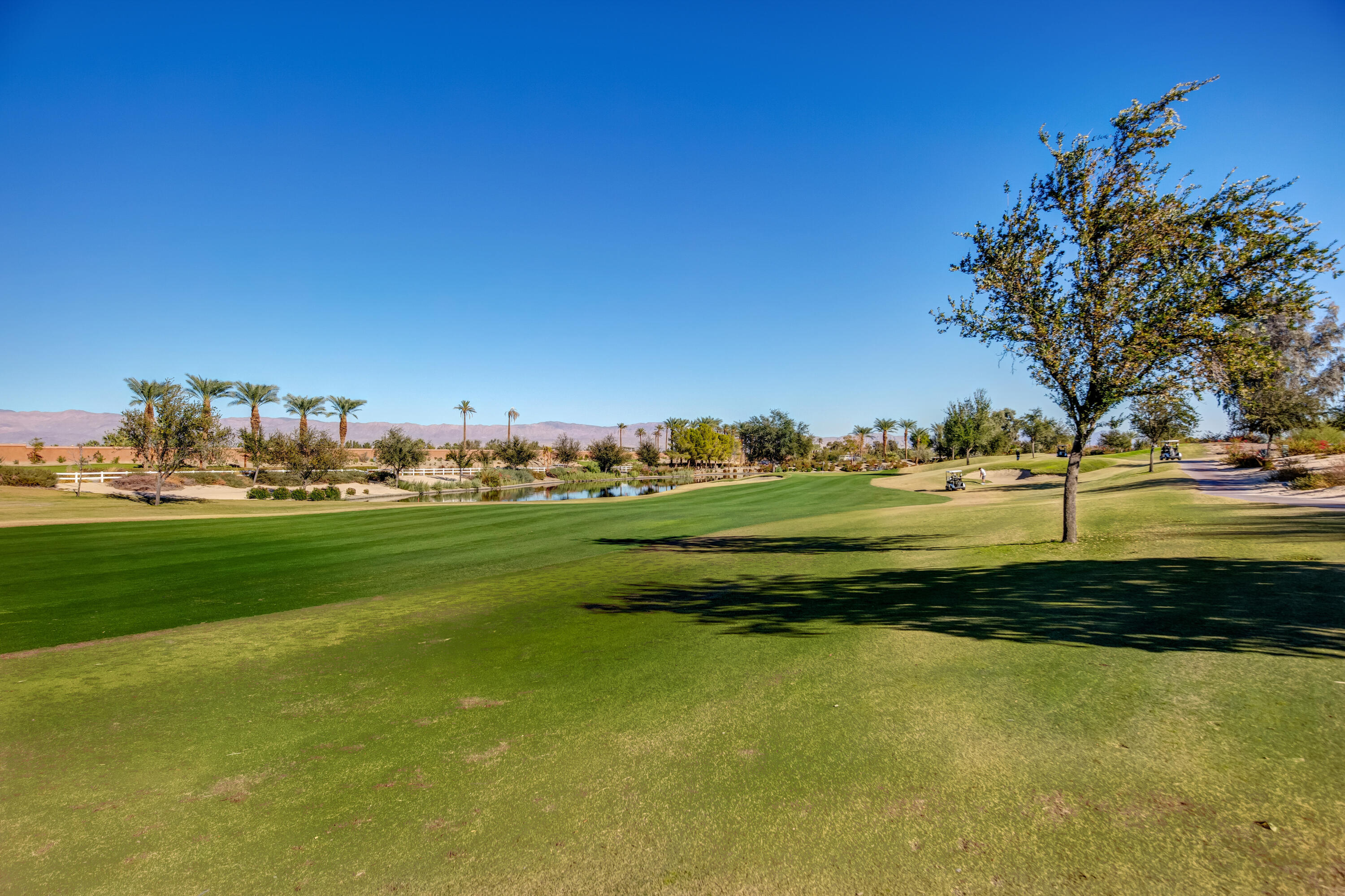61232 Cactus Spring Drive La Quinta, CA 92253 - Photo 42 of 43 a view of a lake with houses