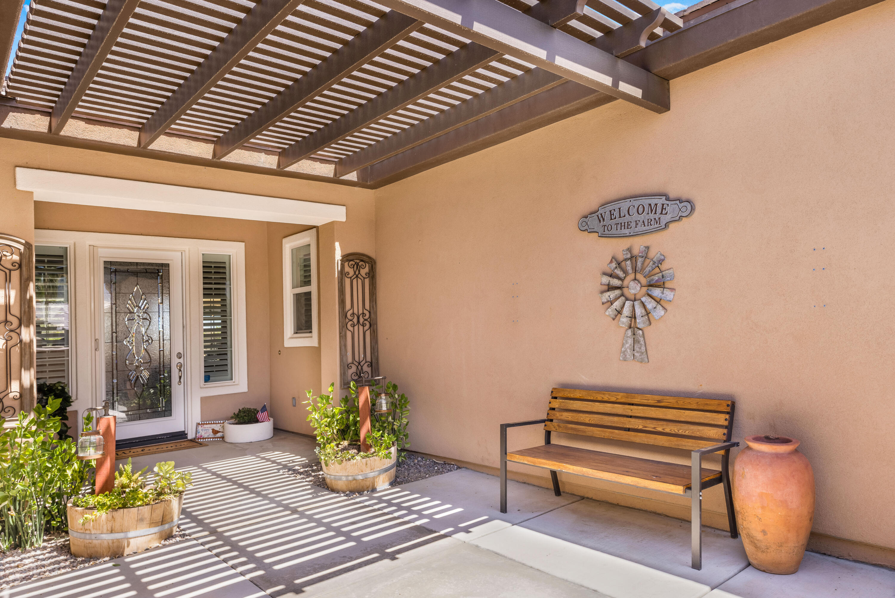 61232 Cactus Spring Drive La Quinta, CA 92253 - Photo 5 of 43 a view of patio with a table and chairs