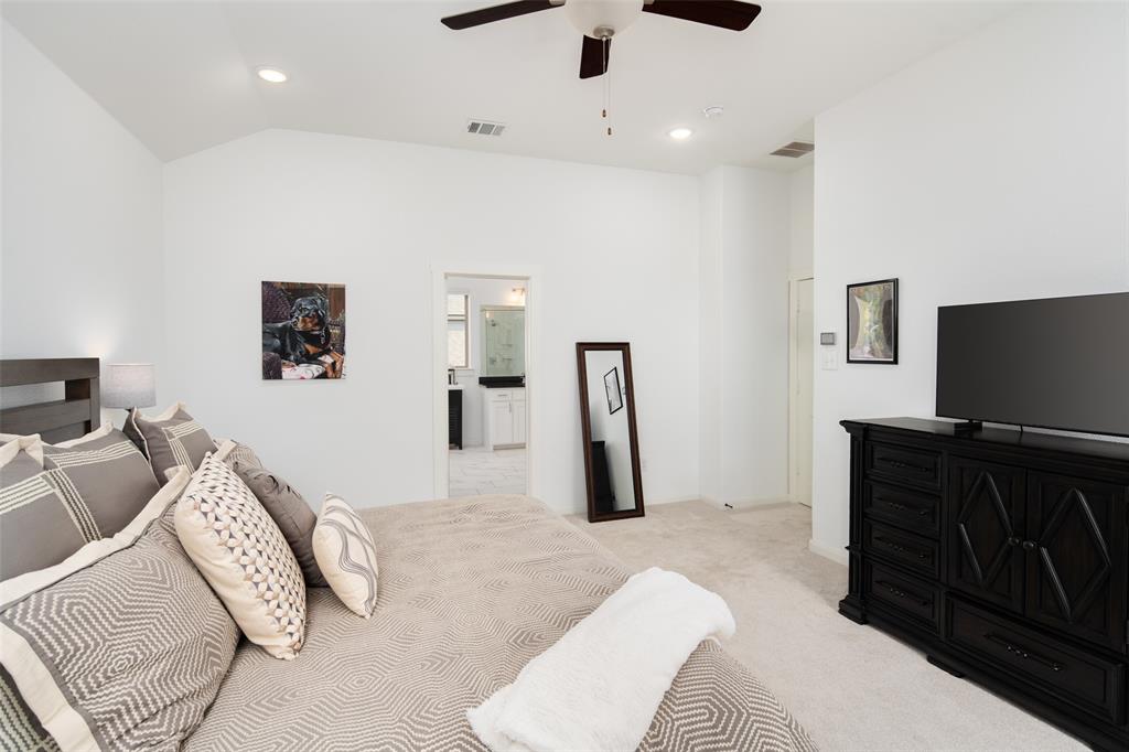 4881 Miles Way Fairview, TX 75069 - Photo 16 of 39 a living room with furniture and a flat screen tv