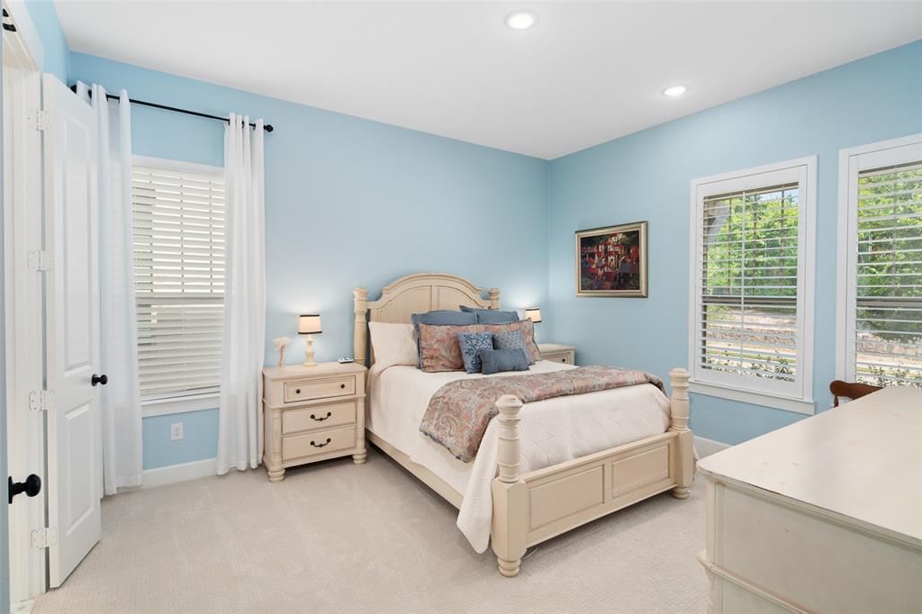 4881 Miles Way Fairview, TX 75069 - Photo 20 of 39 a bed room with a bed and a window