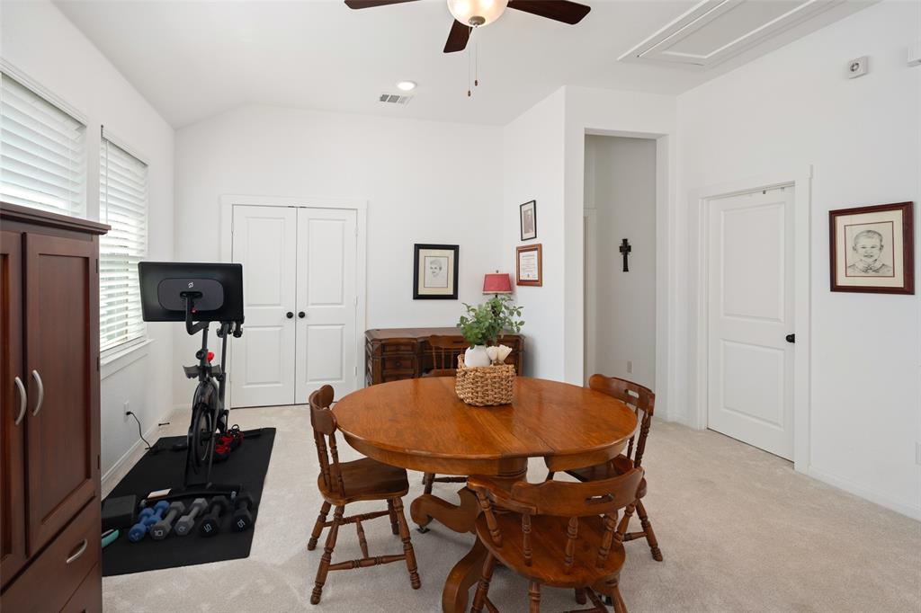 4881 Miles Way Fairview, TX 75069 - Photo 25 of 39 a view of a dining room with furniture
