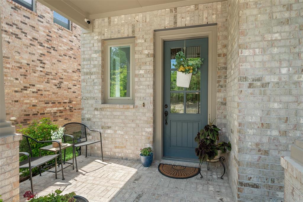 4881 Miles Way Fairview, TX 75069 - Photo 34 of 39 a view of a porch with chairs and potted plants